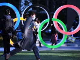MASKED AND MUTED OLYMPICS WILL STILL DOMINATE CROWDED 2021
