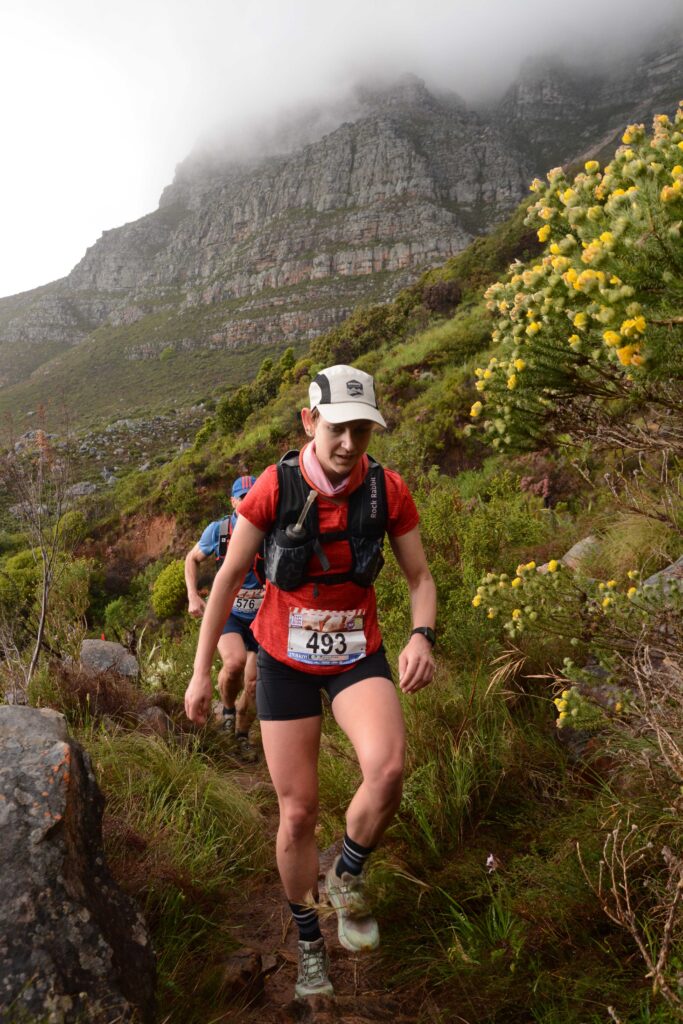 Nadine van Driel leads the women's race through 6km on the climb to the contour path