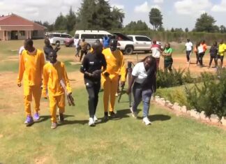 Eliud Kipchoge champions refugee athletes chasing glory in youth Olympics Legendary Kenyan marathoner Eliud Kipchoge (in black) takes a walk with refuge athletes in Kaptagat, Kenya. Photo: Courtesy