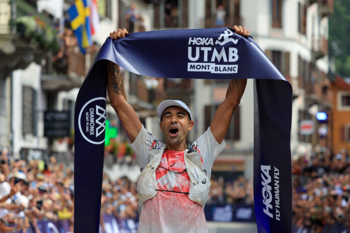 Feels so Good - Ben Dhiman enjoys the moment after winning the UTMB in the fastest time ever. Photo - UTMB Franck Oddoux