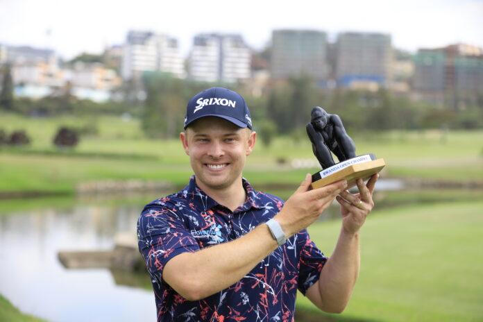 Kyle De Beer celebrates with the Rwanda Open trophy in Kigali, Rwanda on September 27, 2026. Photo: Elie Niyokwizerwa, Sunshine Tour